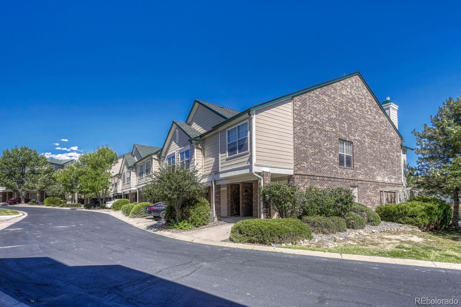 2149 Eagle Avenue Superior, CO 80027 - Photo 30 of 31 a front view of a house with a yard