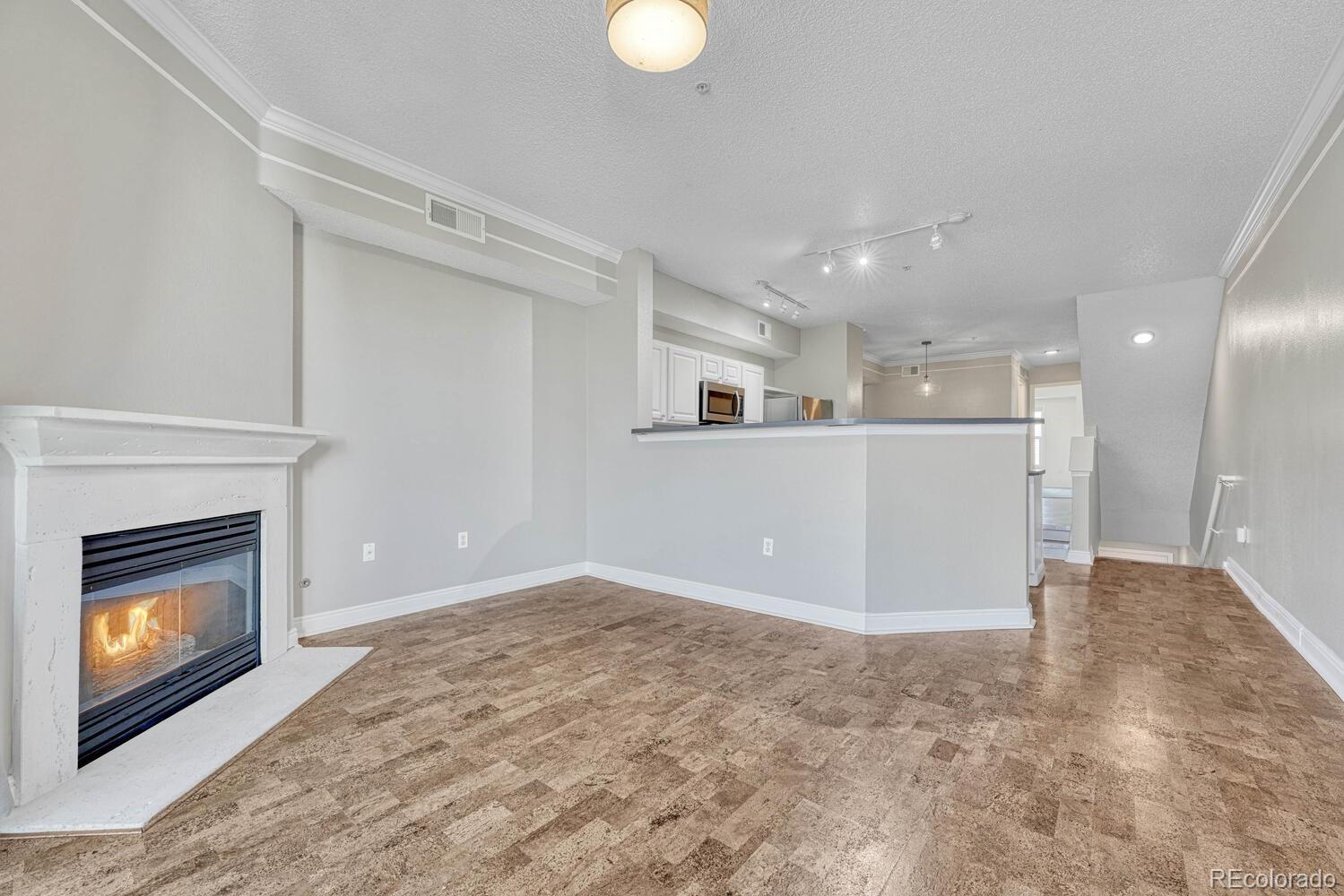 2149 Eagle Avenue Superior, CO 80027 - Photo 7 of 31 a view of an empty room and fire place