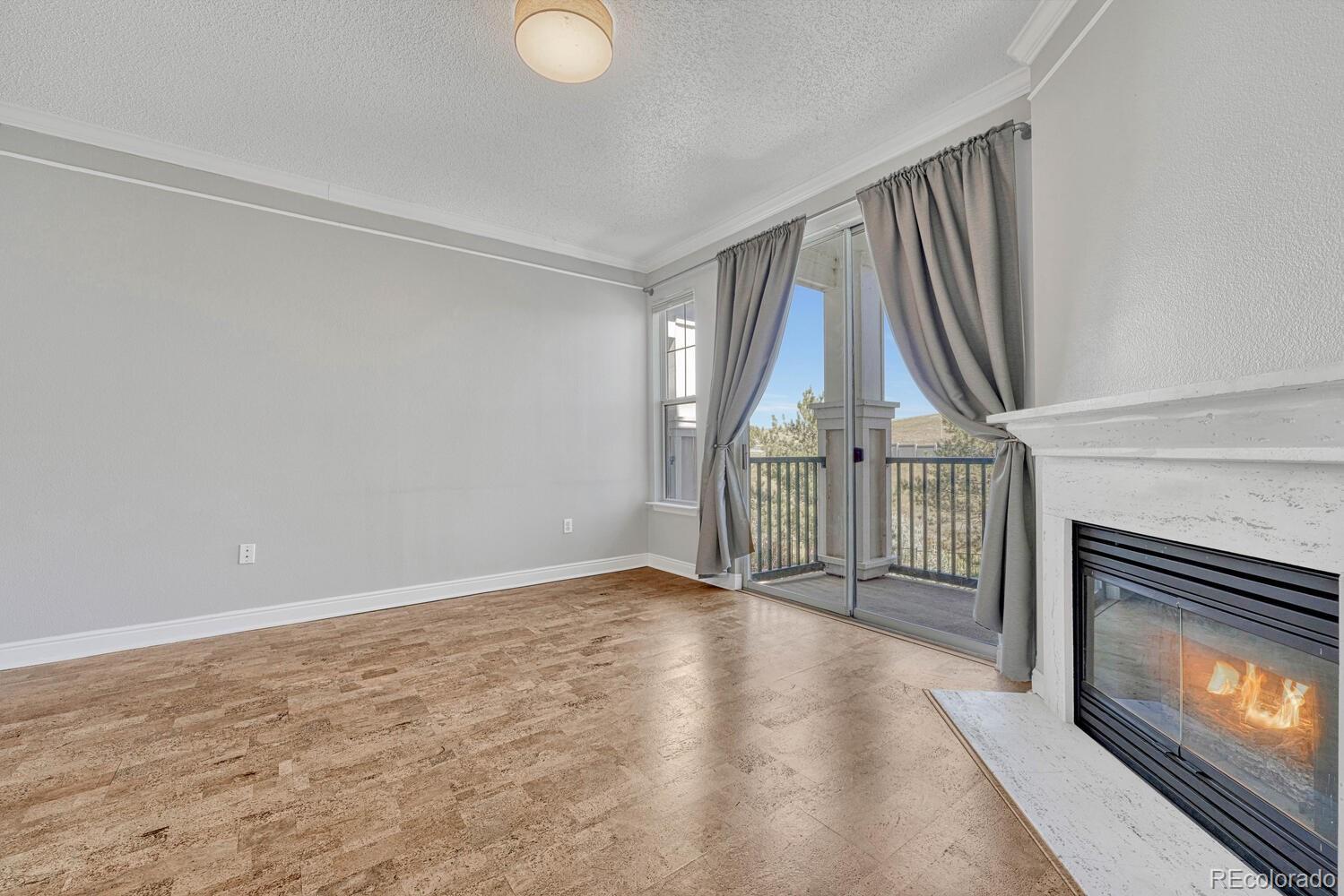 2149 Eagle Avenue Superior, CO 80027 - Photo 8 of 31 a view of an entryway with a fireplace