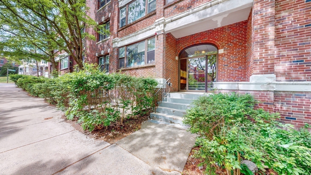 26 Chiswick Road, Unit 13 Boston, MA 02135 - Photo 11 of 11 a front view of a house with garden