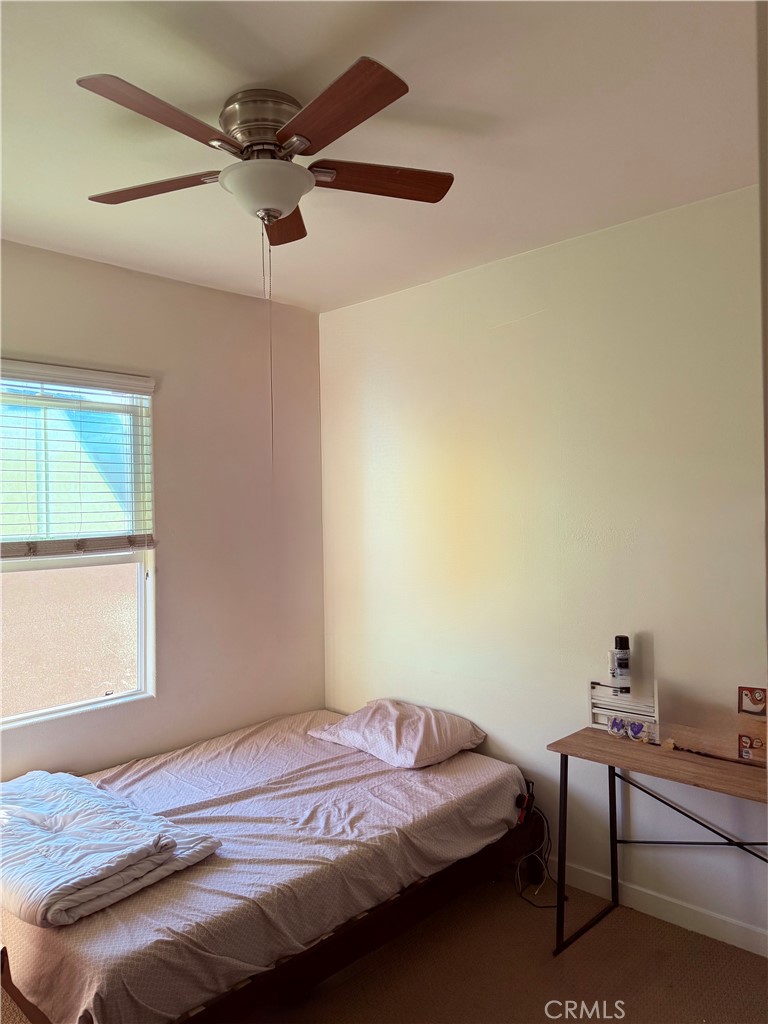 2230 Indus Way San Marcos, CA 92078 - Photo 17 of 26 a bedroom with a bed and a window