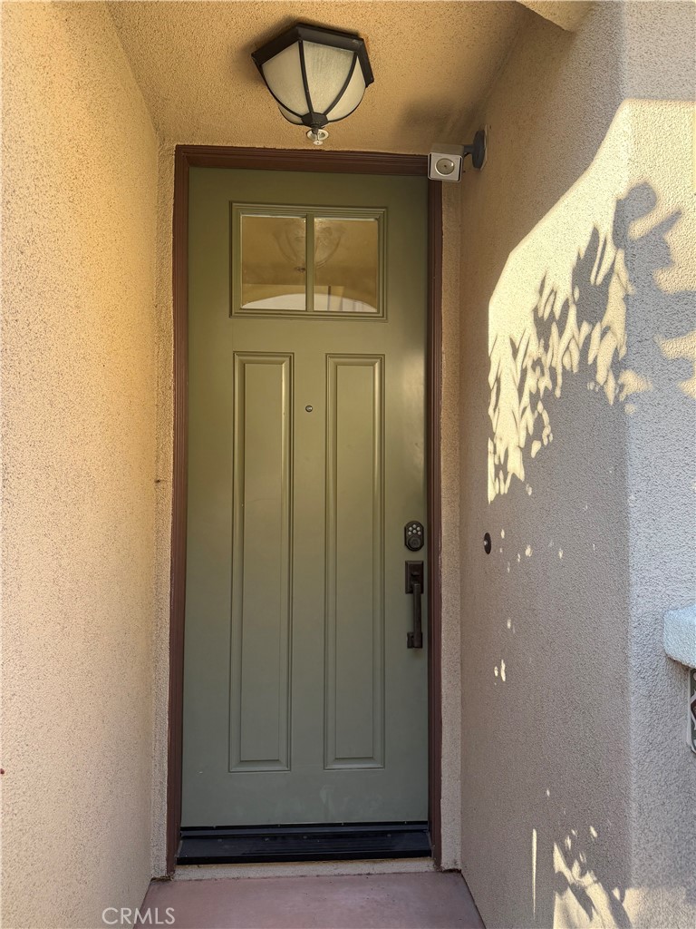 2230 Indus Way San Marcos, CA 92078 - Photo 3 of 26 a view of front door with a door