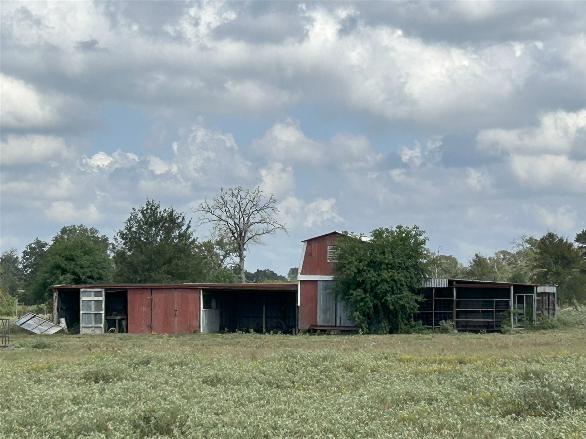 32868 Fm 1736 Road Hempstead, TX 77445 - Photo 12 of 18 a view of a wooden fence with a bench in front of house