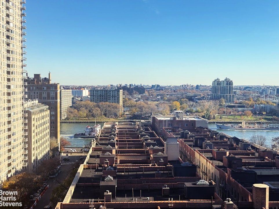 460 East 79th Street, Unit 16A Manhattan, NY 10075 - Photo 7 of 20 a city view with tall buildings