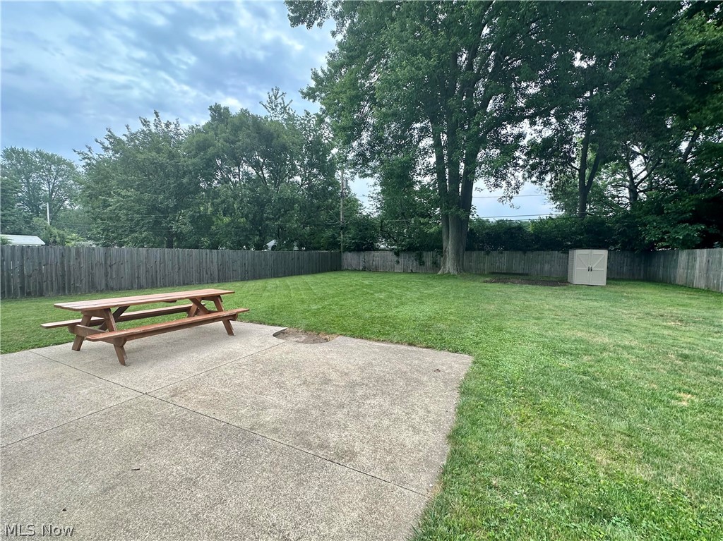 1867 Perth Road Madison, OH 44057 - Photo 26 of 31 View of backyard, patio & storage shed.
