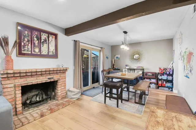 a view of a livingroom with furniture and fireplace