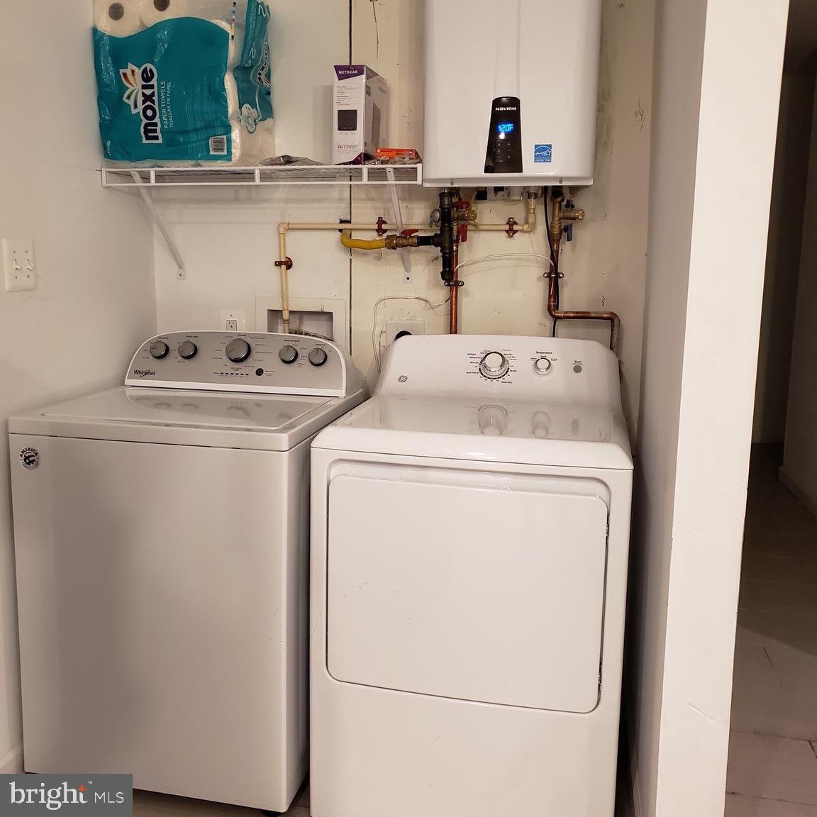 1002 8th Street Laurel, MD 20707 - Photo 19 of 19 a utility room with dryer and washer