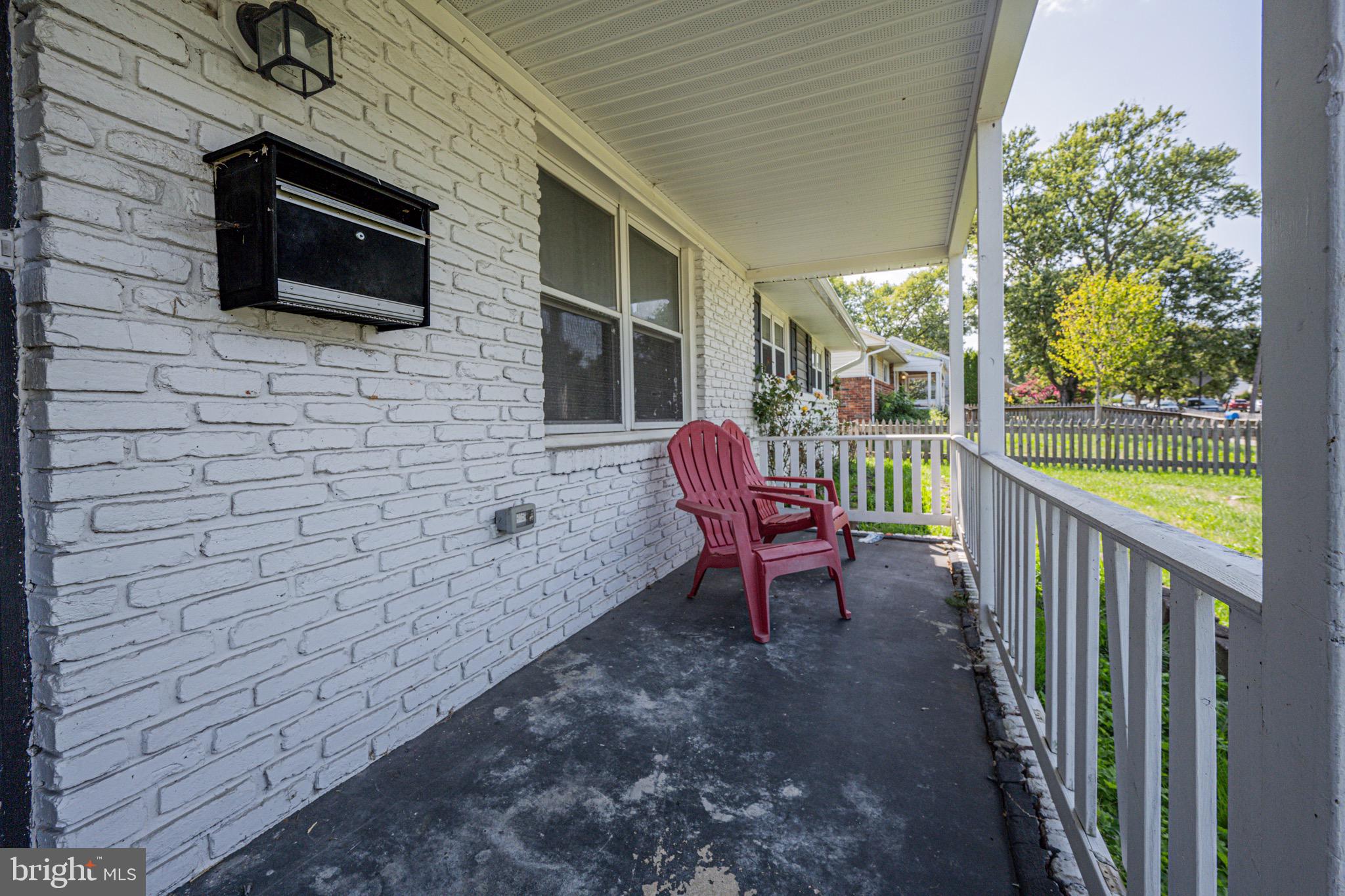 1002 8th Street Laurel, MD 20707 - Photo 3 of 19 a view of a porch with furniture