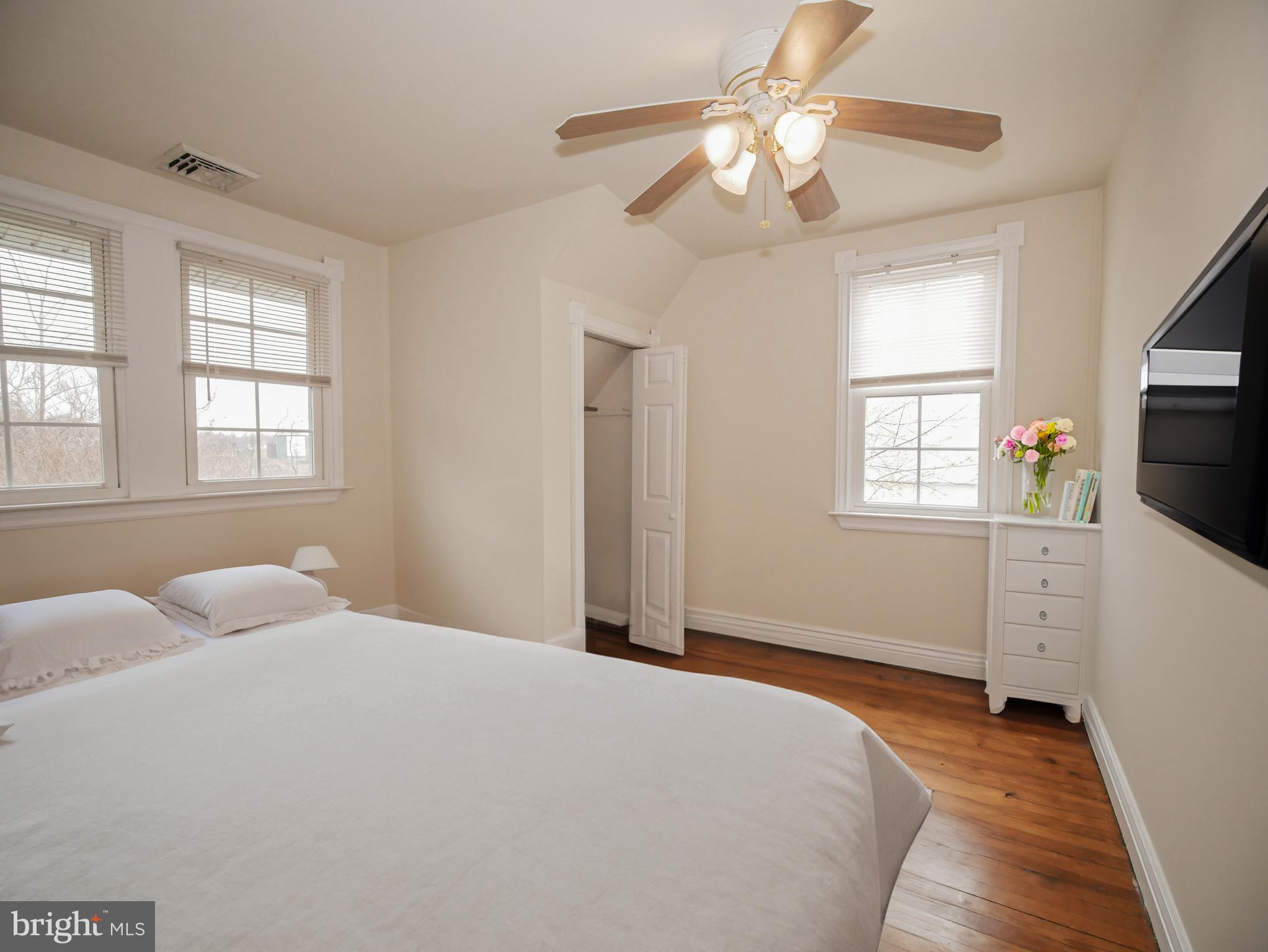 332 Crown Point Road Thorofare, NJ 08086 - Photo 31 of 36 a bedroom with a beds chandelier and a window