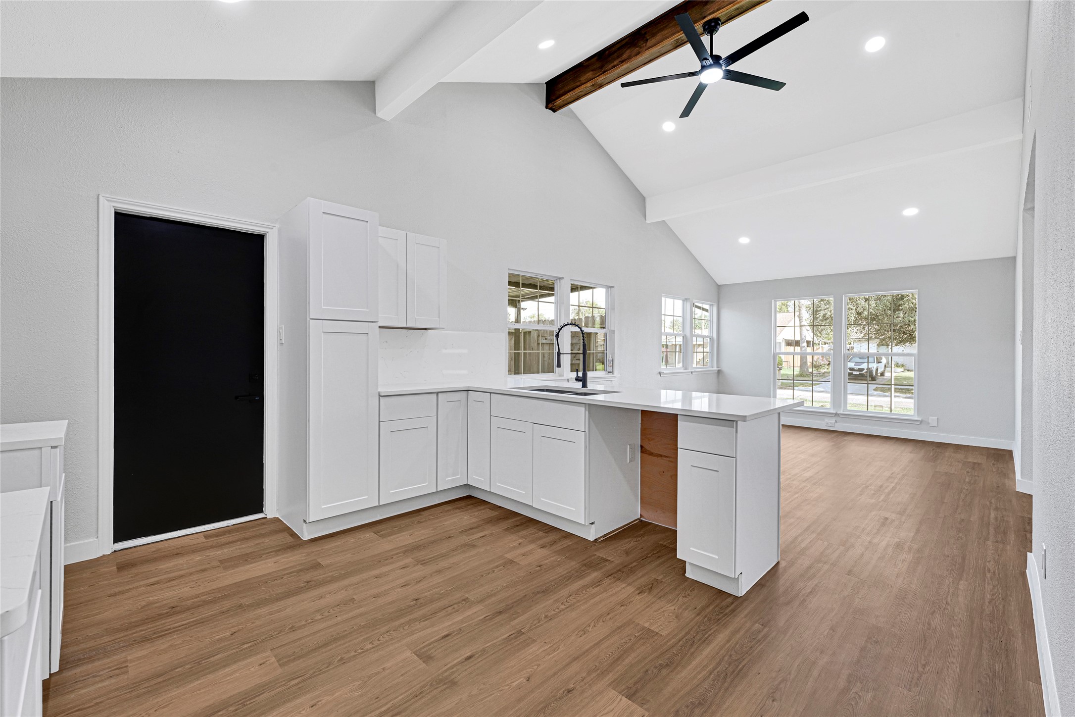 5213 Shirley Street Baytown, TX 77521 - Photo 9 of 12 a kitchen with a hard wood floor