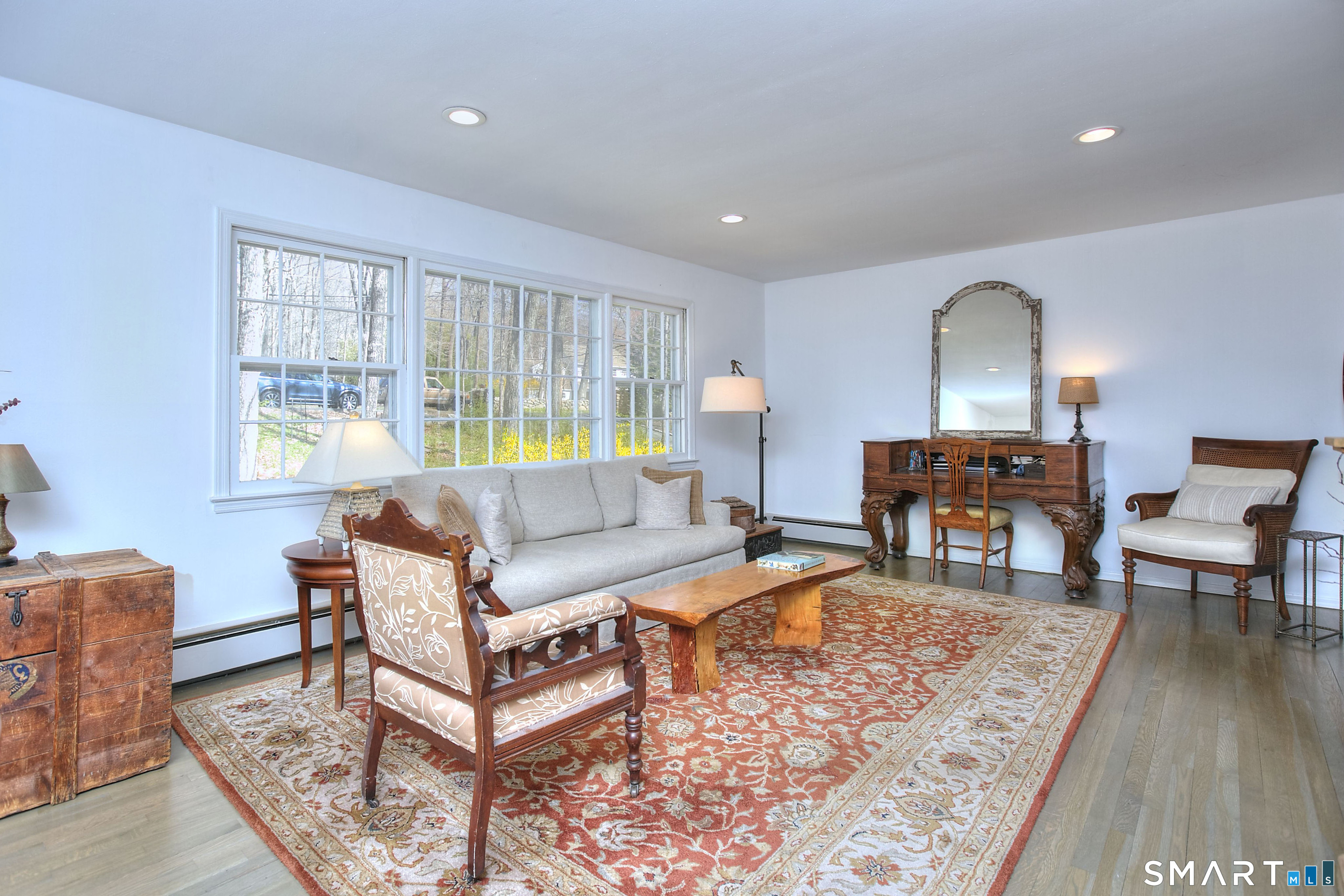 7 Richmond Hill Road Weston, CT 06883 - Photo 13 of 33 a living room with furniture and a wooden floor