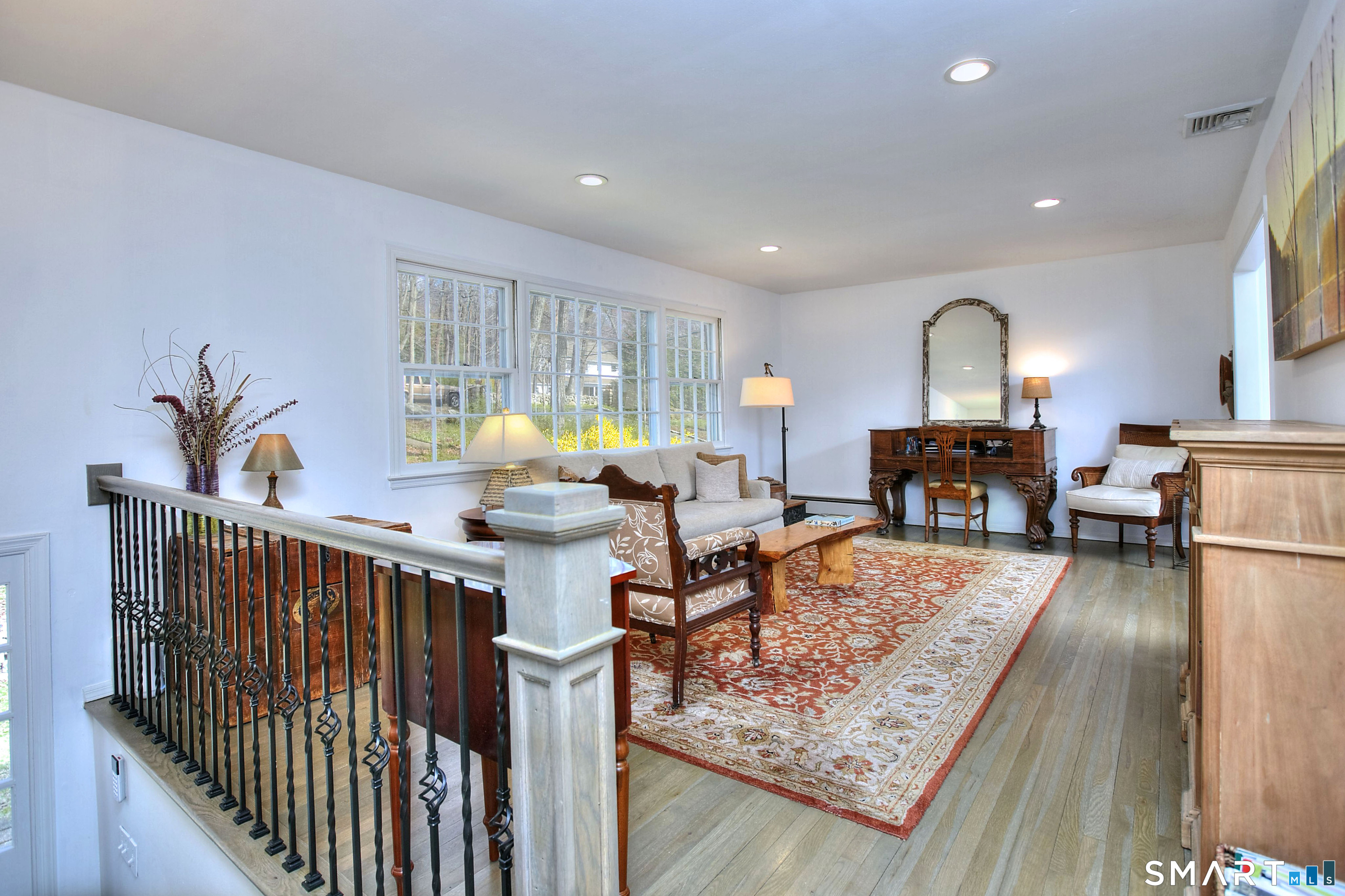 7 Richmond Hill Road Weston, CT 06883 - Photo 14 of 33 a living room with furniture and a table