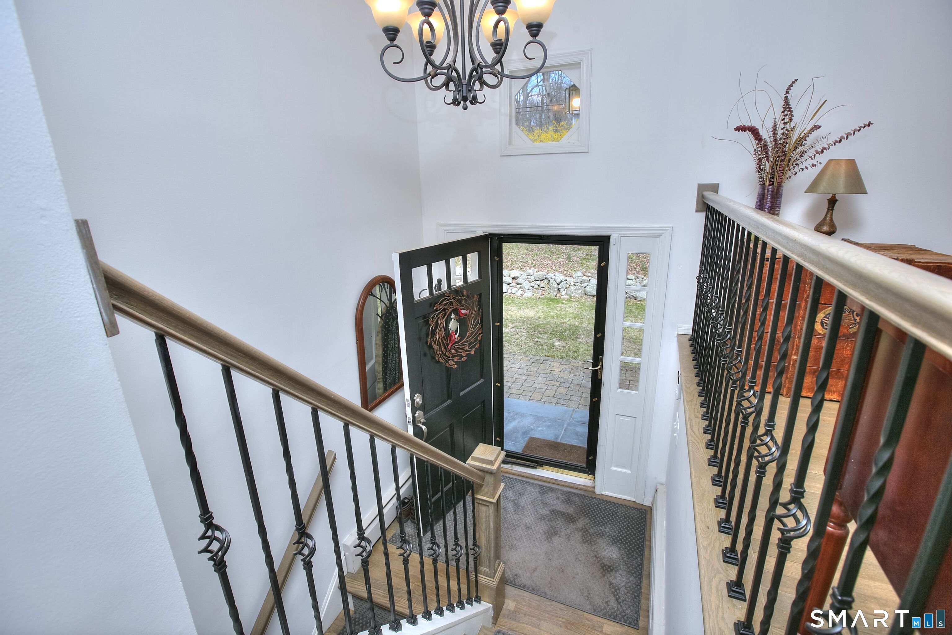 7 Richmond Hill Road Weston, CT 06883 - Photo 15 of 33 a view of a hallway with wooden floor and staircase