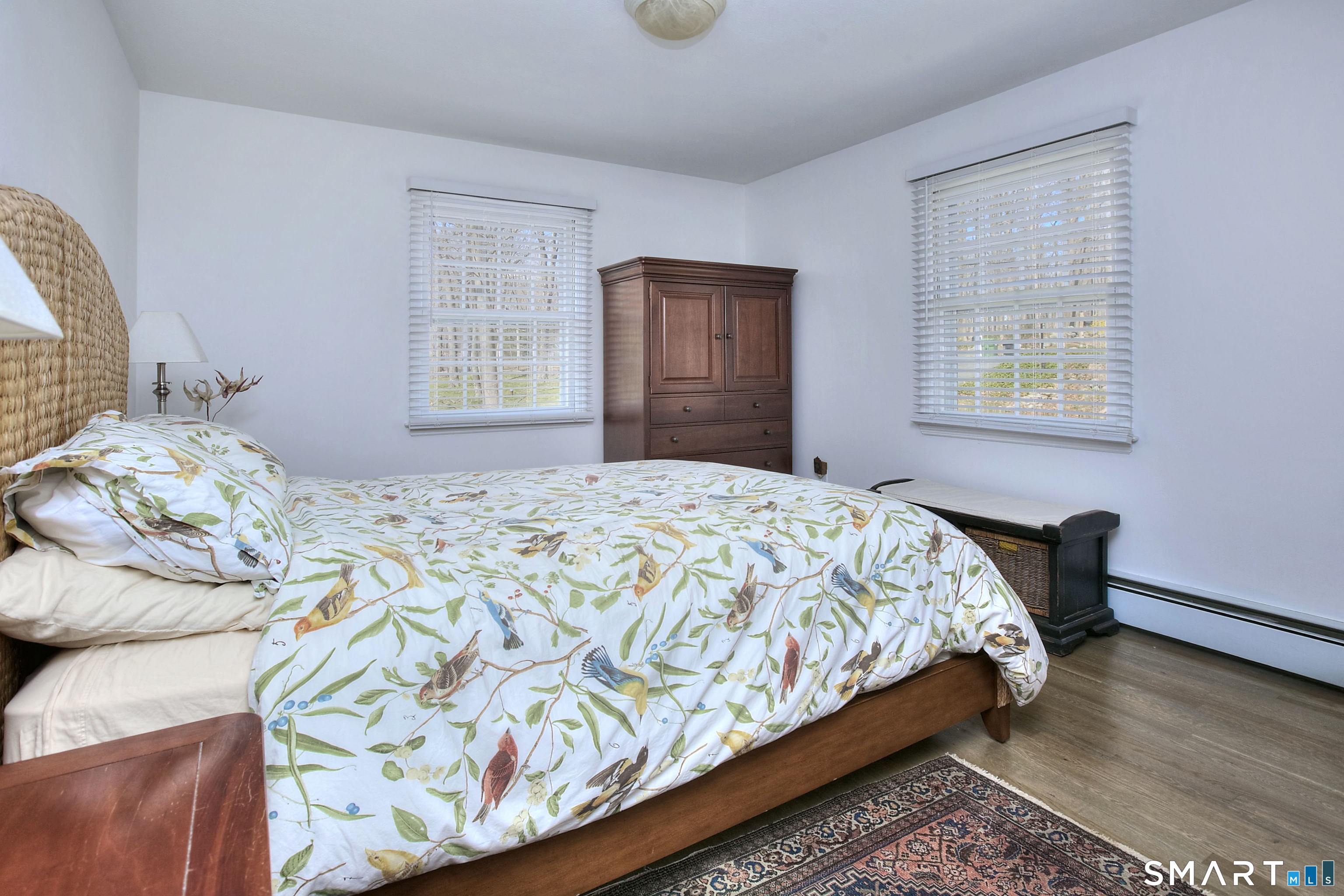 7 Richmond Hill Road Weston, CT 06883 - Photo 17 of 33 a bedroom with a bed and window