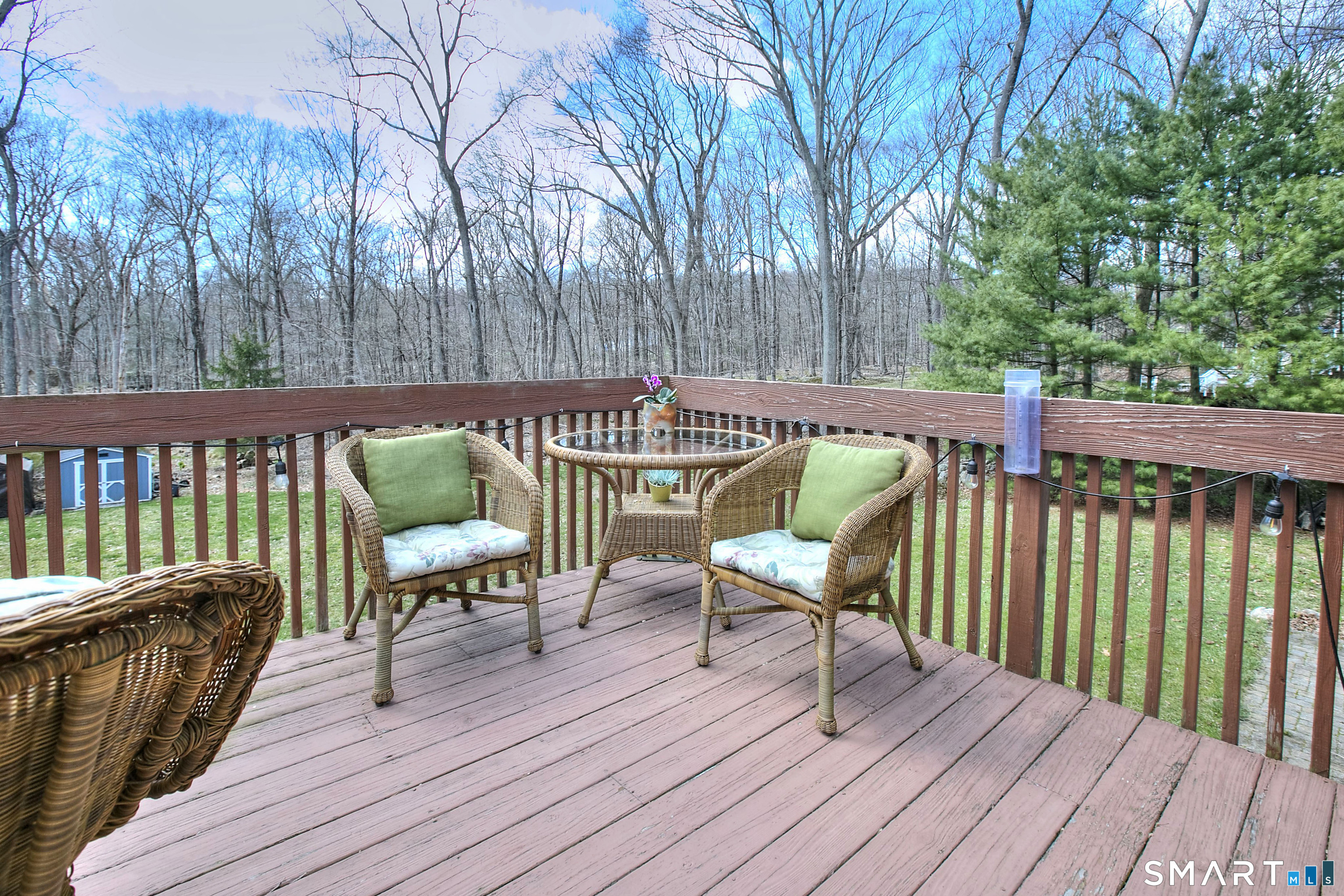 7 Richmond Hill Road Weston, CT 06883 - Photo 2 of 33 a balcony with wooden floor outdoor seating and wooden floors