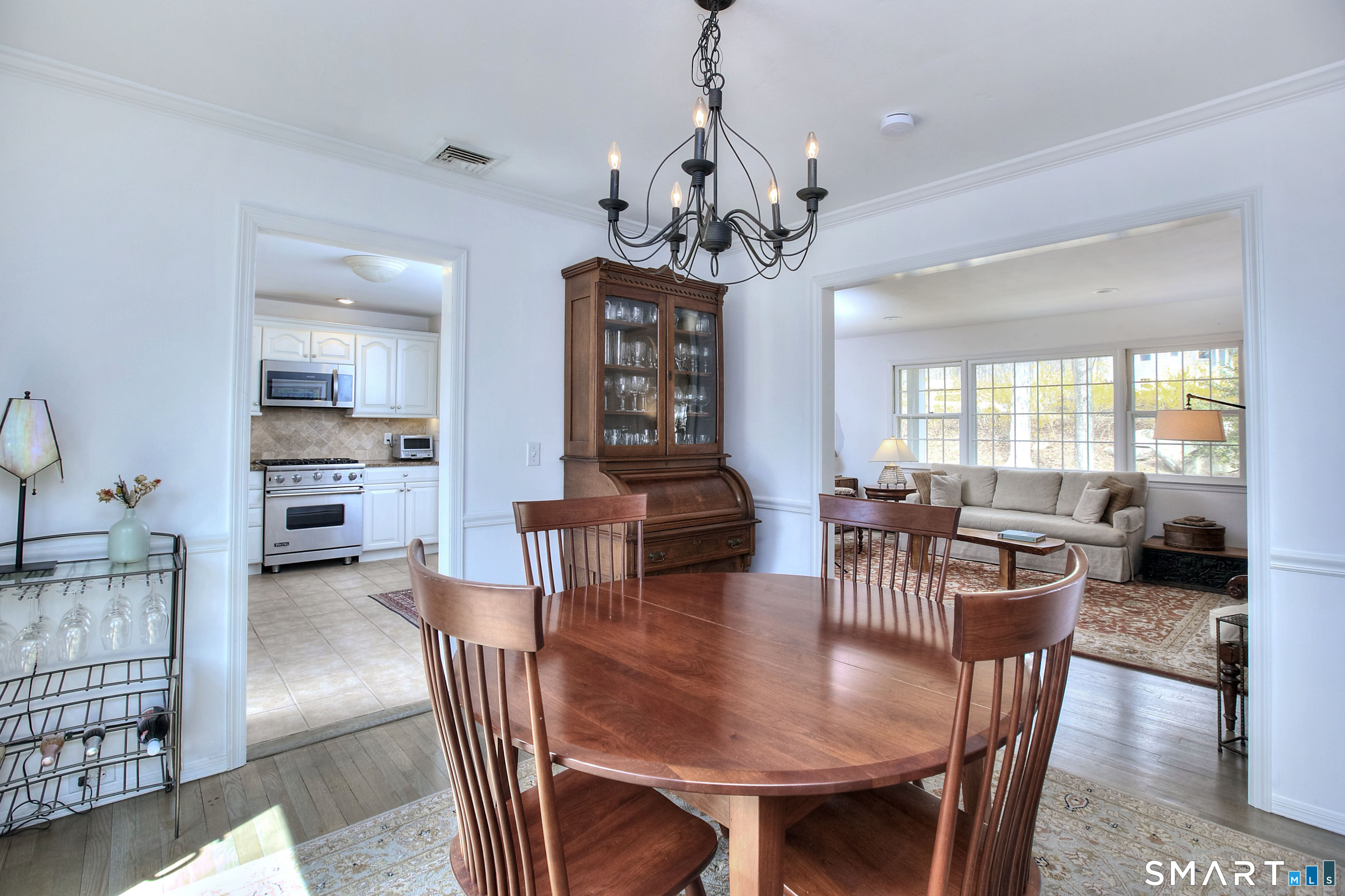 7 Richmond Hill Road Weston, CT 06883 - Photo 22 of 33 a view of a dining room with furniture window and wooden floor