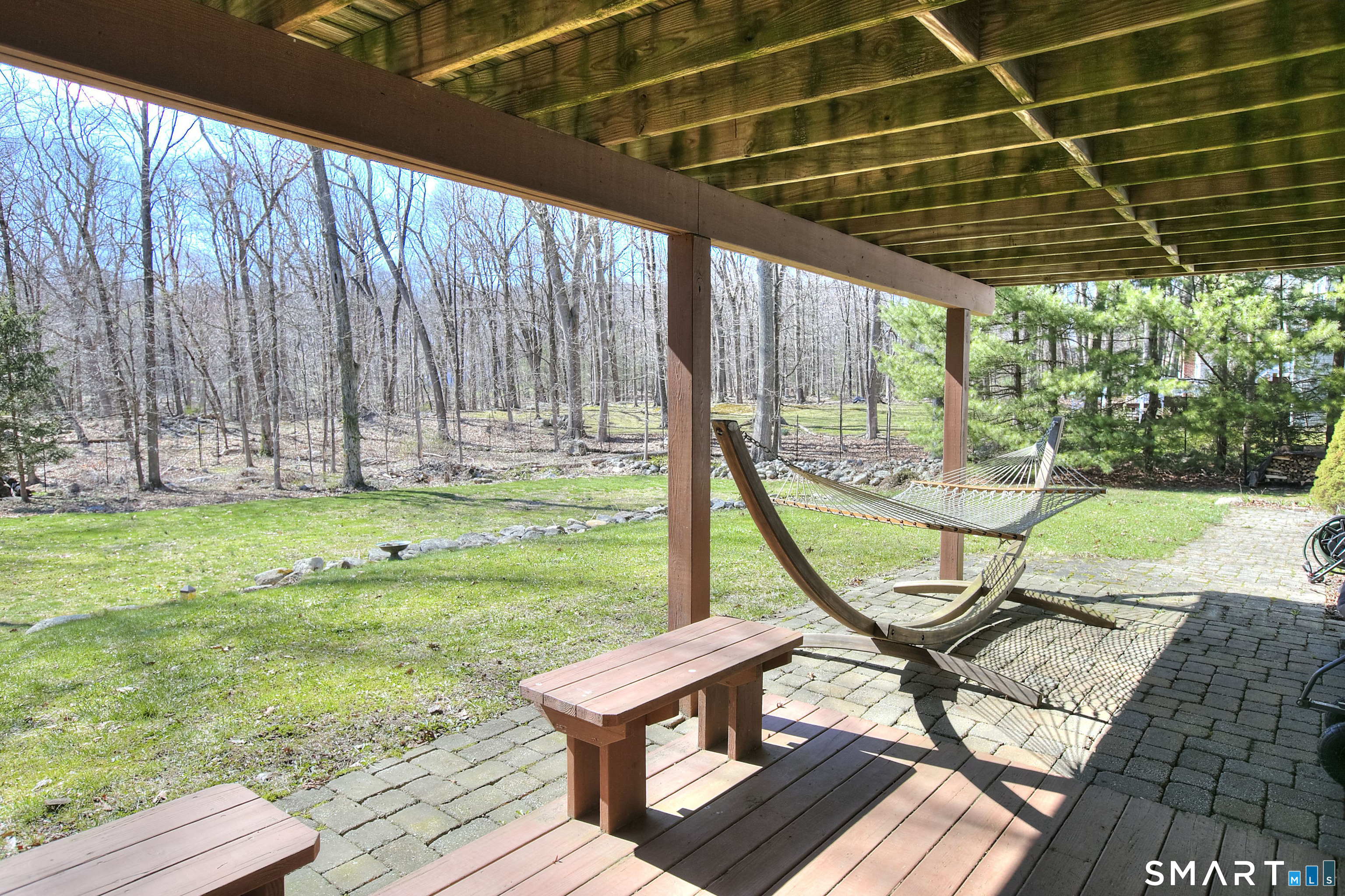 7 Richmond Hill Road Weston, CT 06883 - Photo 30 of 33 a view of a swimming pool with a patio