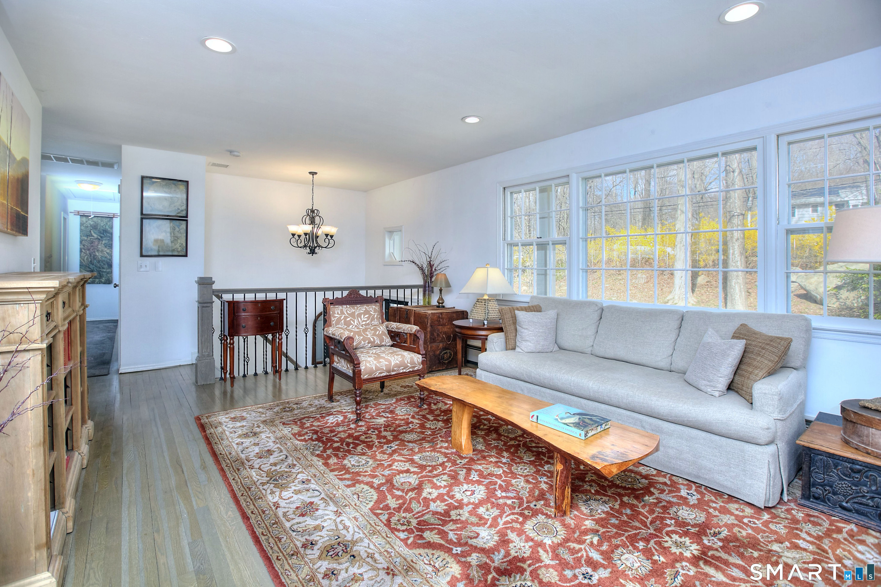 7 Richmond Hill Road Weston, CT 06883 - Photo 9 of 33 a living room with furniture and a wooden floor