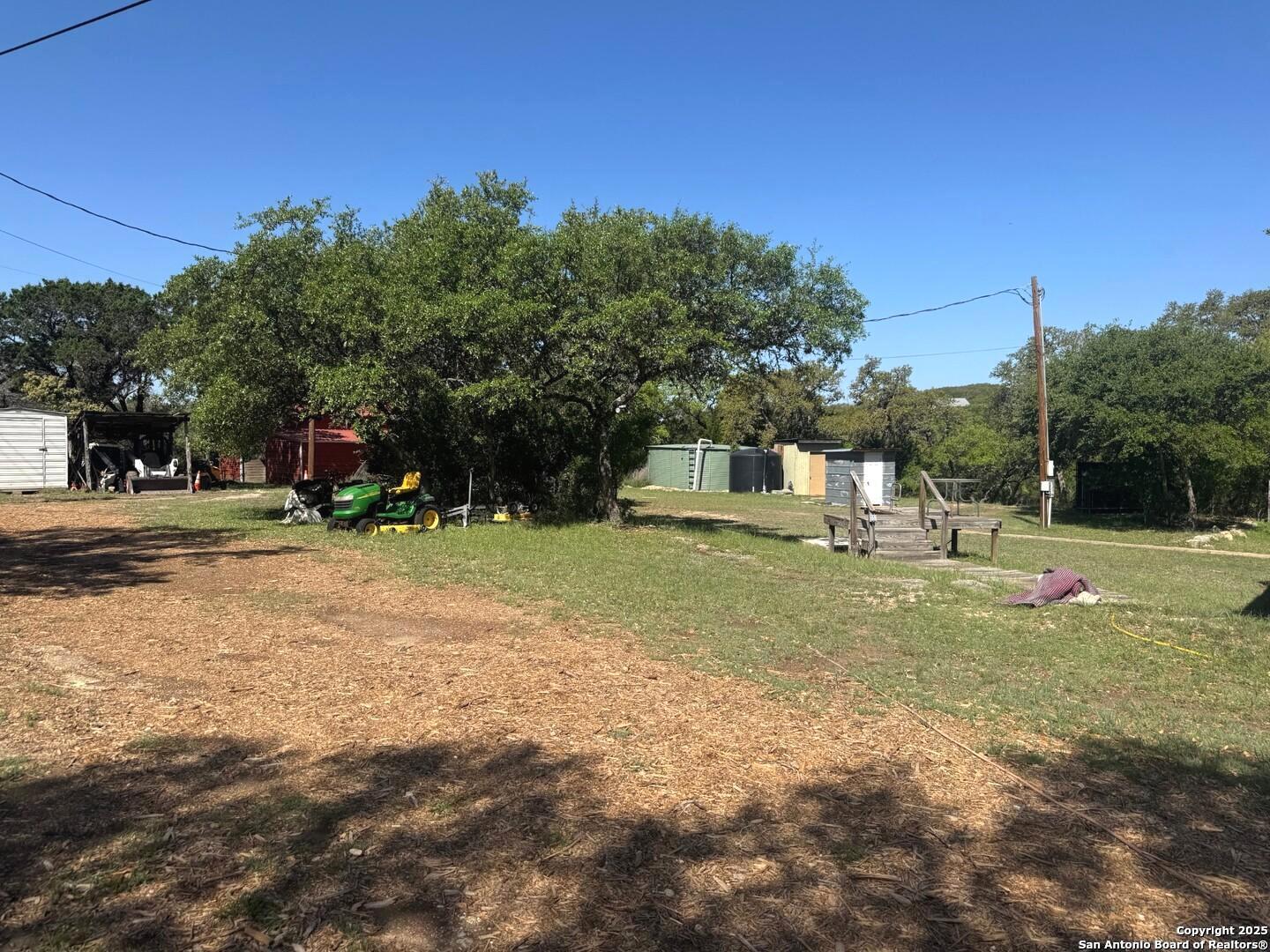 2485 Bump Gate Road Pipe Creek, TX 78063 - Photo 21 of 42 a house view with a sitting space