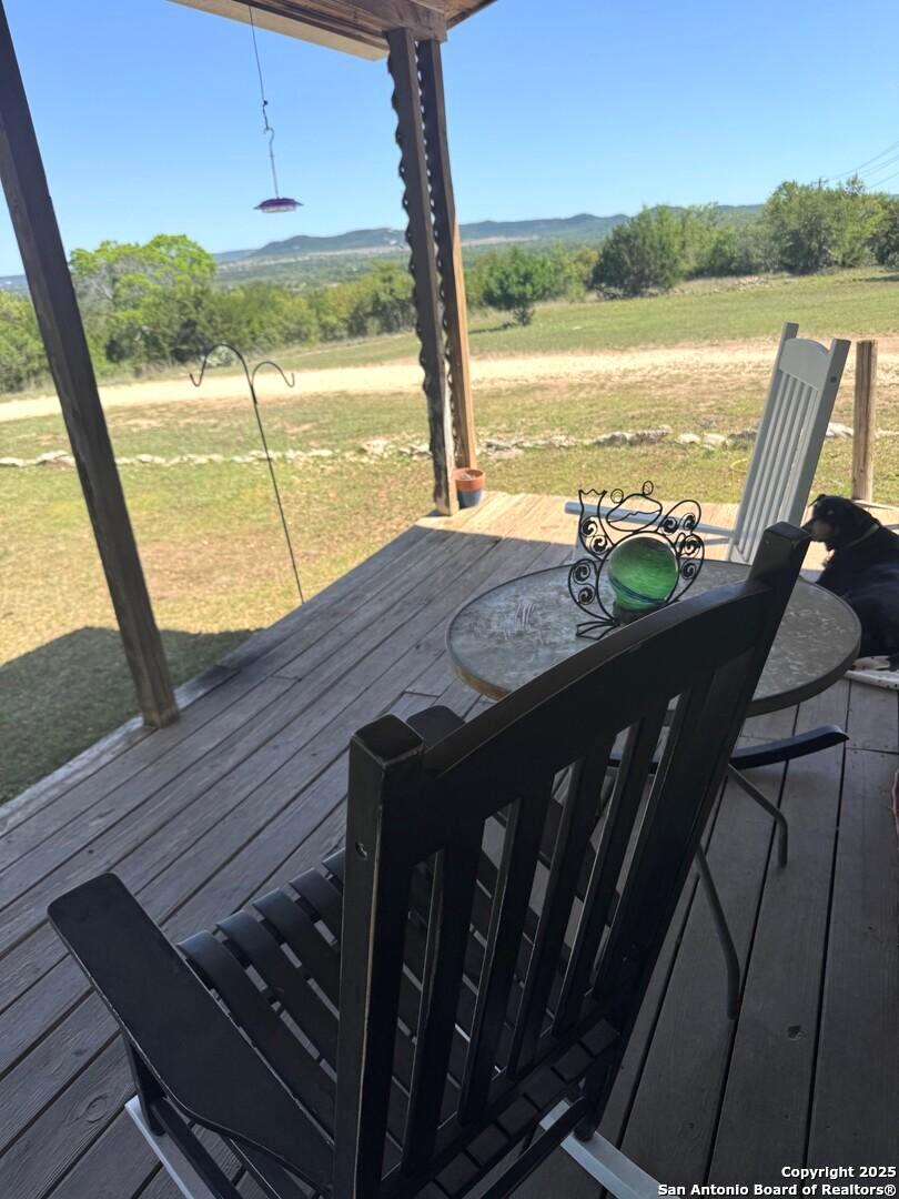 2485 Bump Gate Road Pipe Creek, TX 78063 - Photo 5 of 42 a view of a balcony with lake view and a ocean view