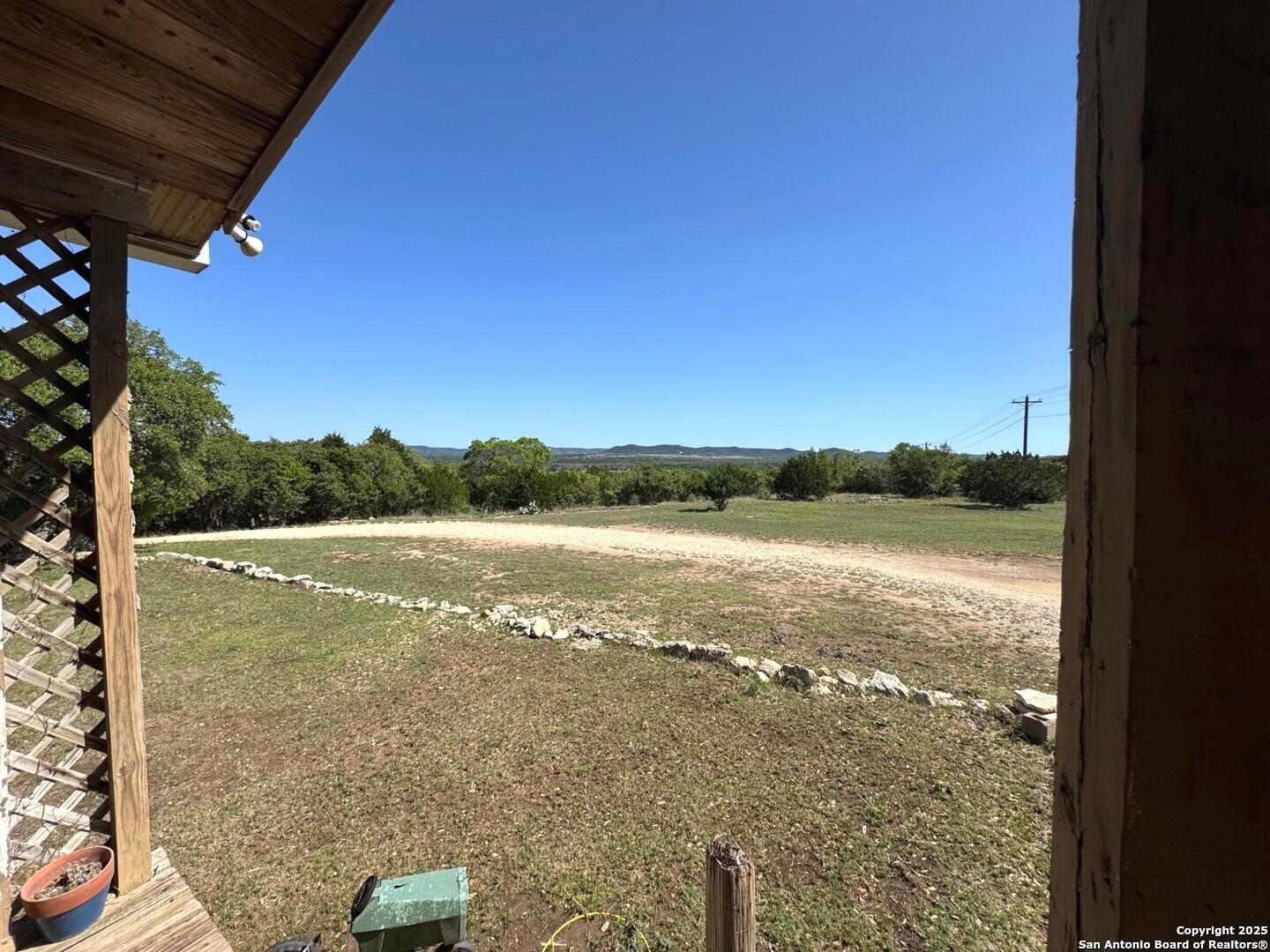 2485 Bump Gate Road Pipe Creek, TX 78063 - Photo 10 of 42 a view of an ocean from a balcony