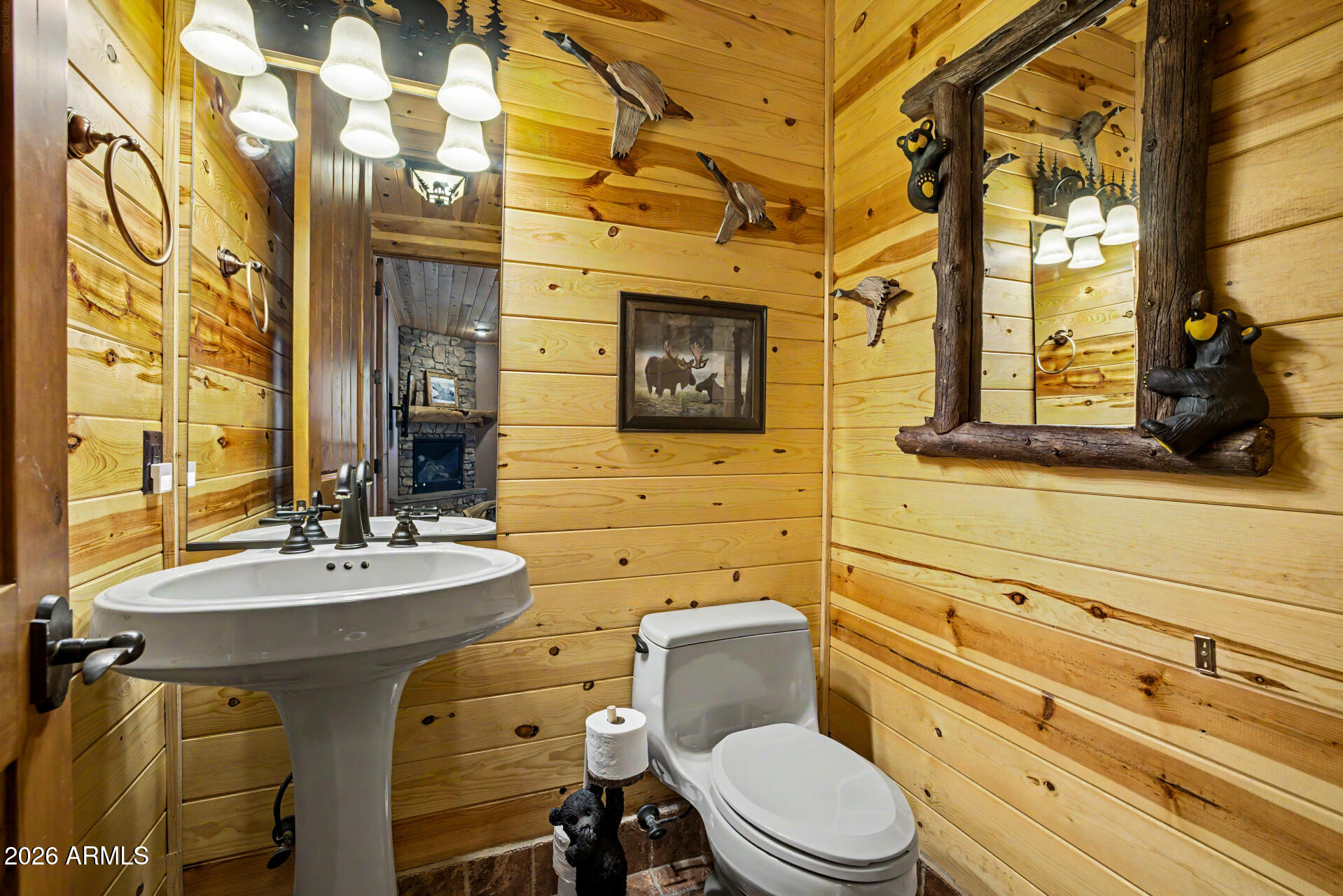 1681 South Jimson Loop Show Low, AZ 85901 - Photo 24 of 105 a bathroom with a sink toilet and mirror