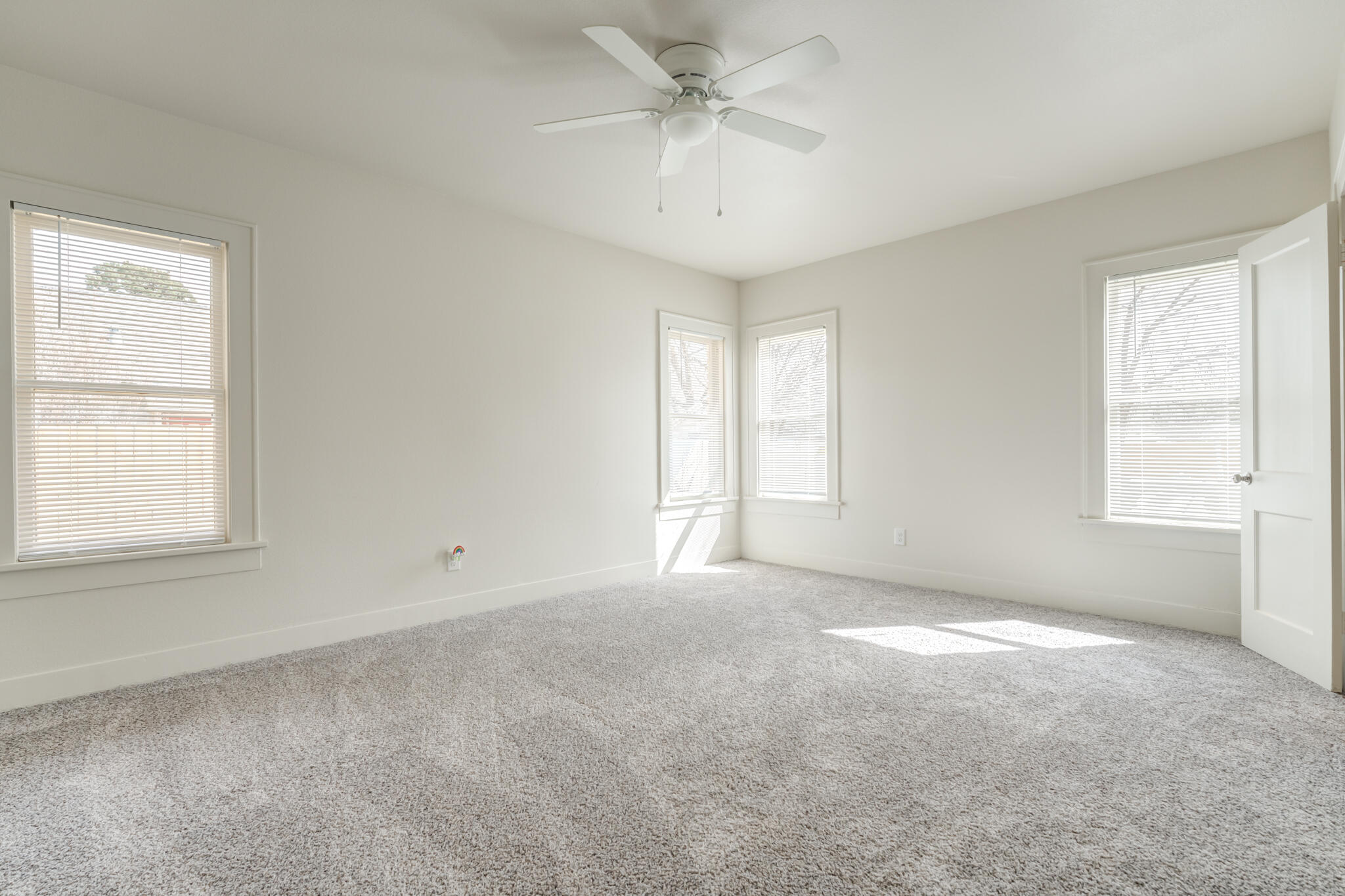 1721 23rd Street Lubbock, TX 79411 - Photo 13 of 29 a view of an empty room with a window