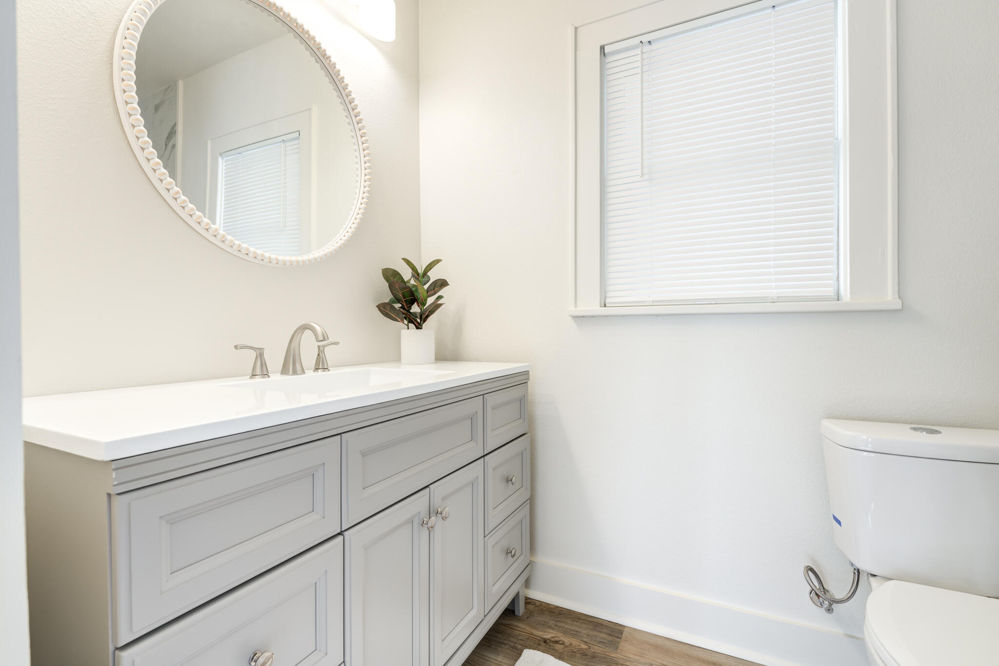 1721 23rd Street Lubbock, TX 79411 - Photo 16 of 29 a bathroom with a sink and a mirror