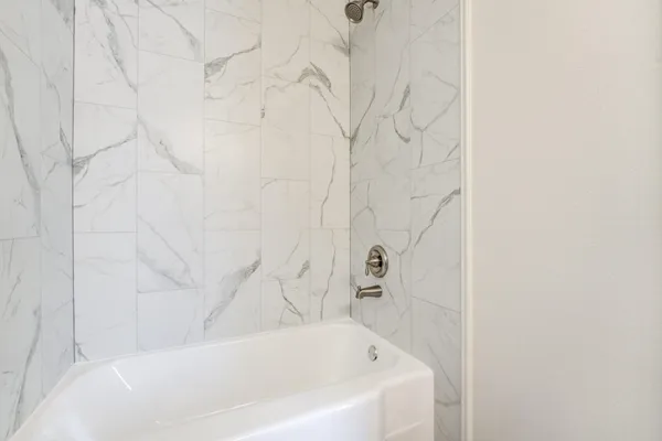 a bathroom with a bathtub