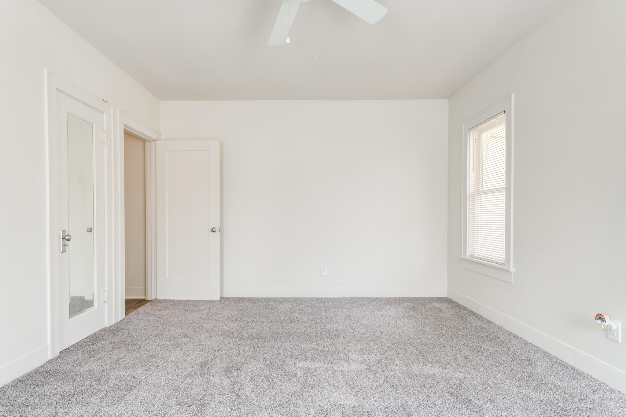 1721 23rd Street Lubbock, TX 79411 - Photo 18 of 29 a view of an empty room and a window