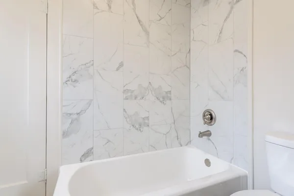 a bathroom with a bathtub
