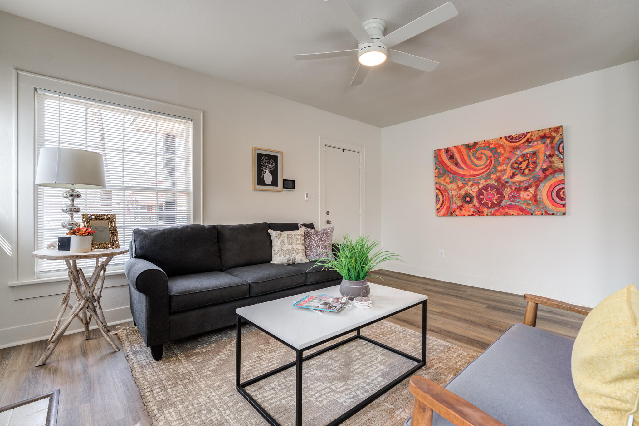 1721 23rd Street Lubbock, TX 79411 - Photo 5 of 29 a living room with furniture and a large window