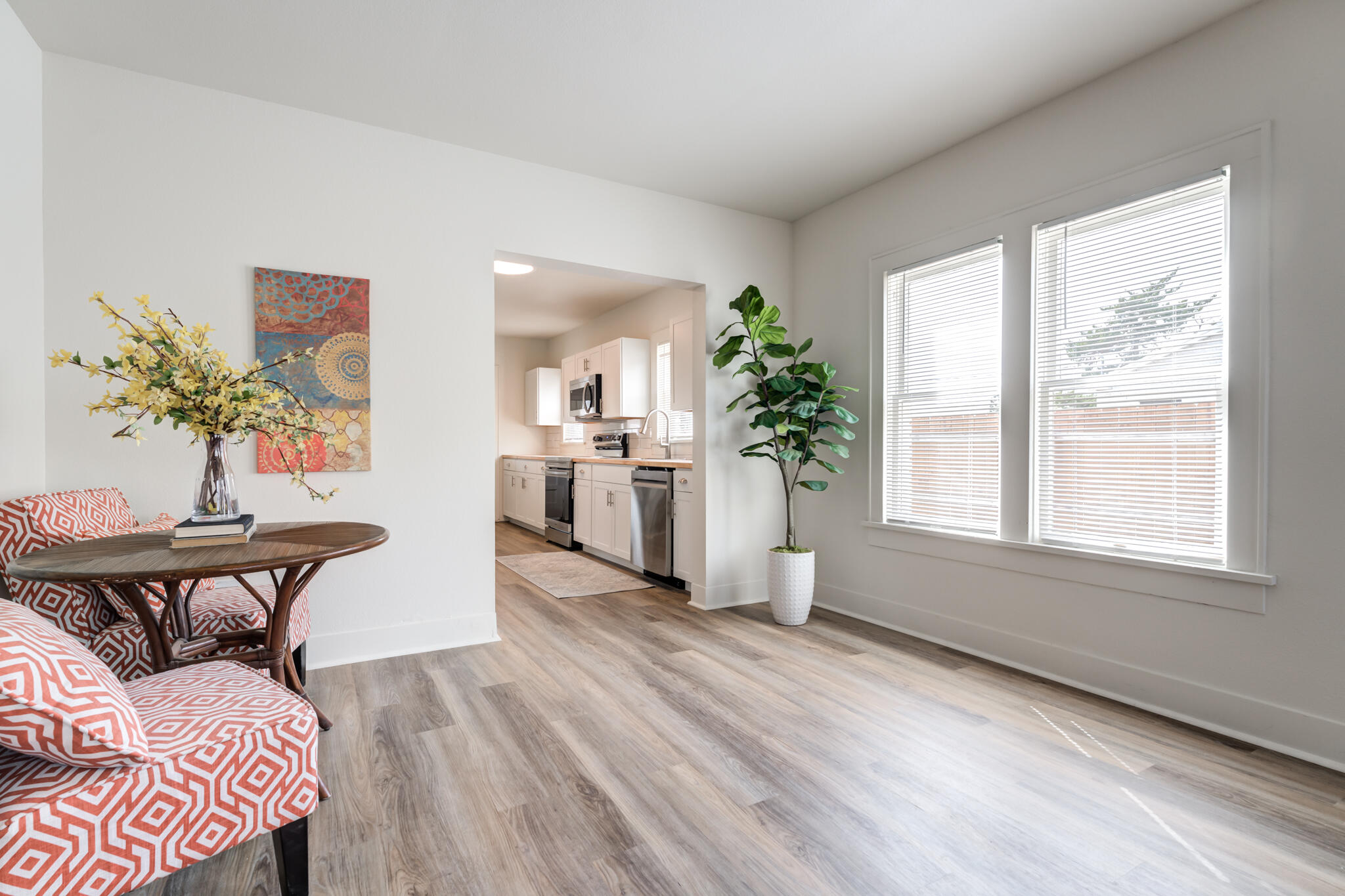 1721 23rd Street Lubbock, TX 79411 - Photo 7 of 29 a living room with furniture and a large window