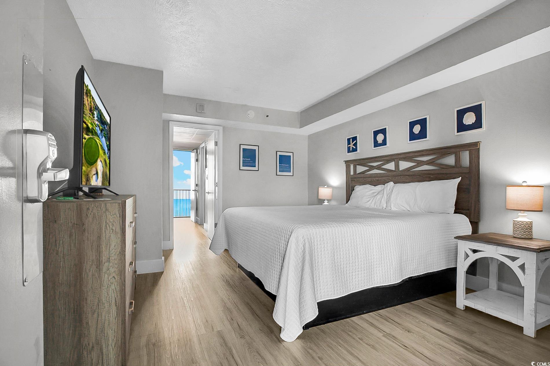 7200 North Ocean Boulevard, Unit 553 Myrtle Beach, SC 29572 - Photo 18 of 27 Dining room with light wood-style flooring