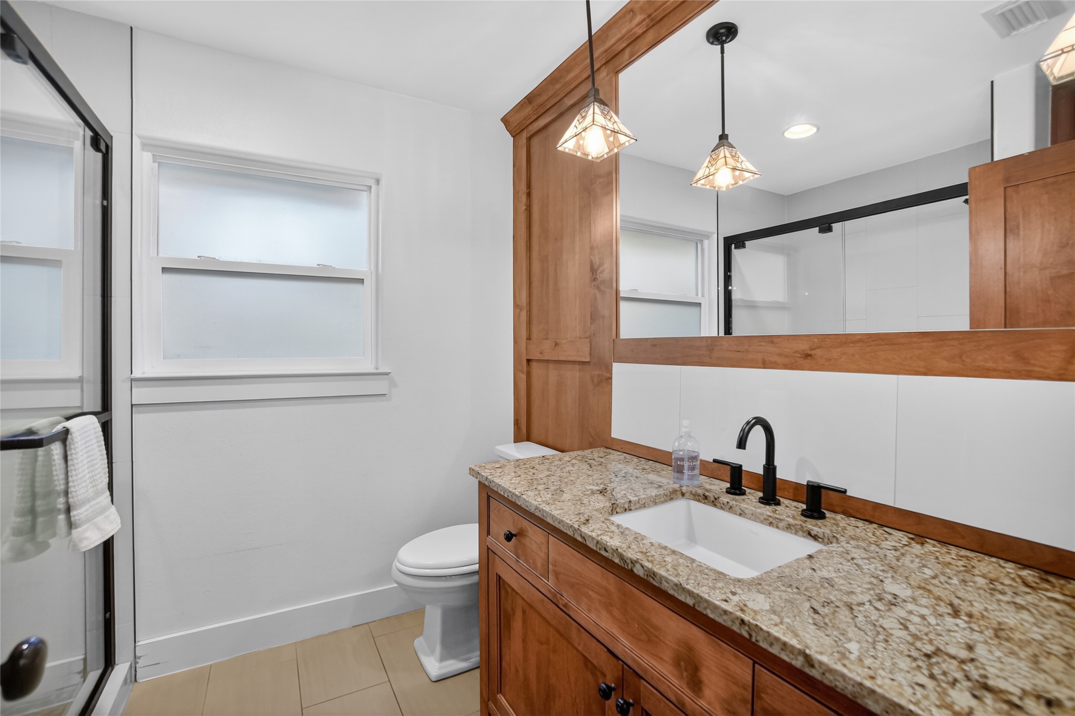 3627 Stoneridge Road Austin, TX 78746 - Photo 21 of 40 Full bath with a shower stall and vanity