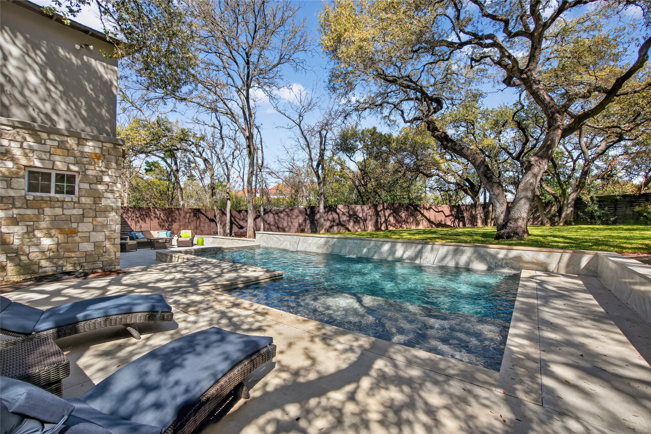 3627 Stoneridge Road Austin, TX 78746 - Photo 23 of 40 View of pool with a fenced backyard and patio surround