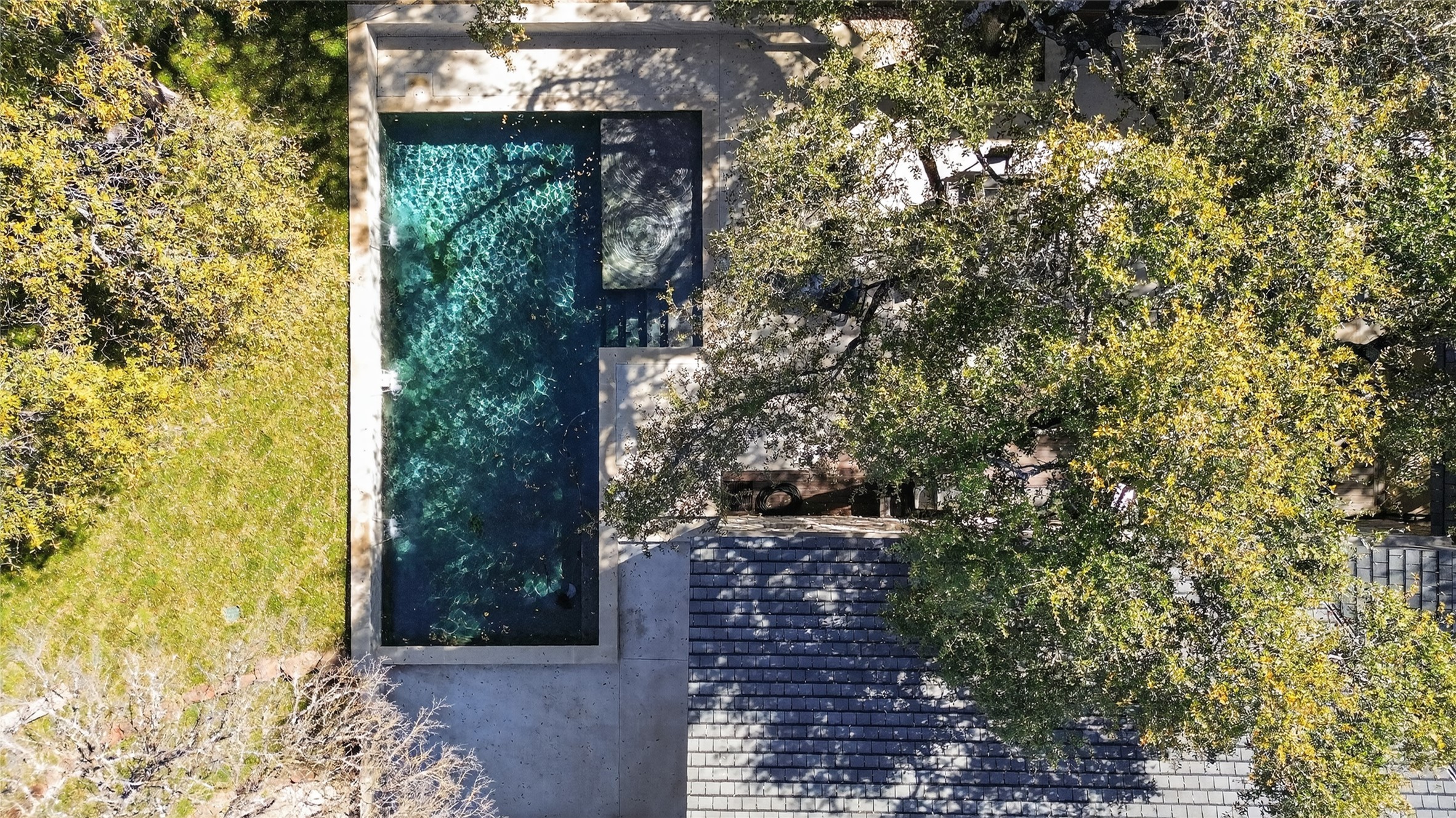 3627 Stoneridge Road Austin, TX 78746 - Photo 36 of 40 Aerial view of a pool