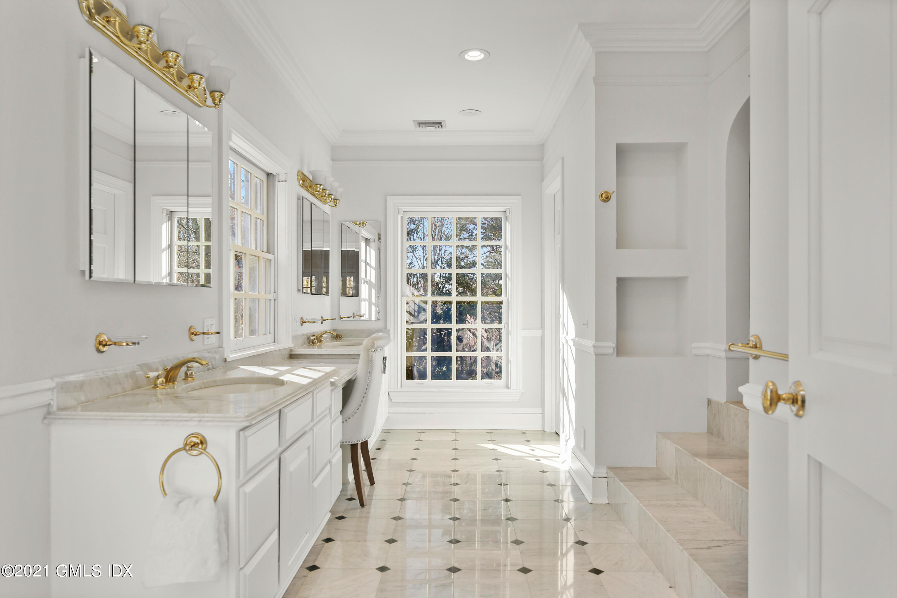 1 Juniper Hill Road Greenwich, CT 06830 - Photo 34 of 73 a bathroom with a sink a mirror and a shower