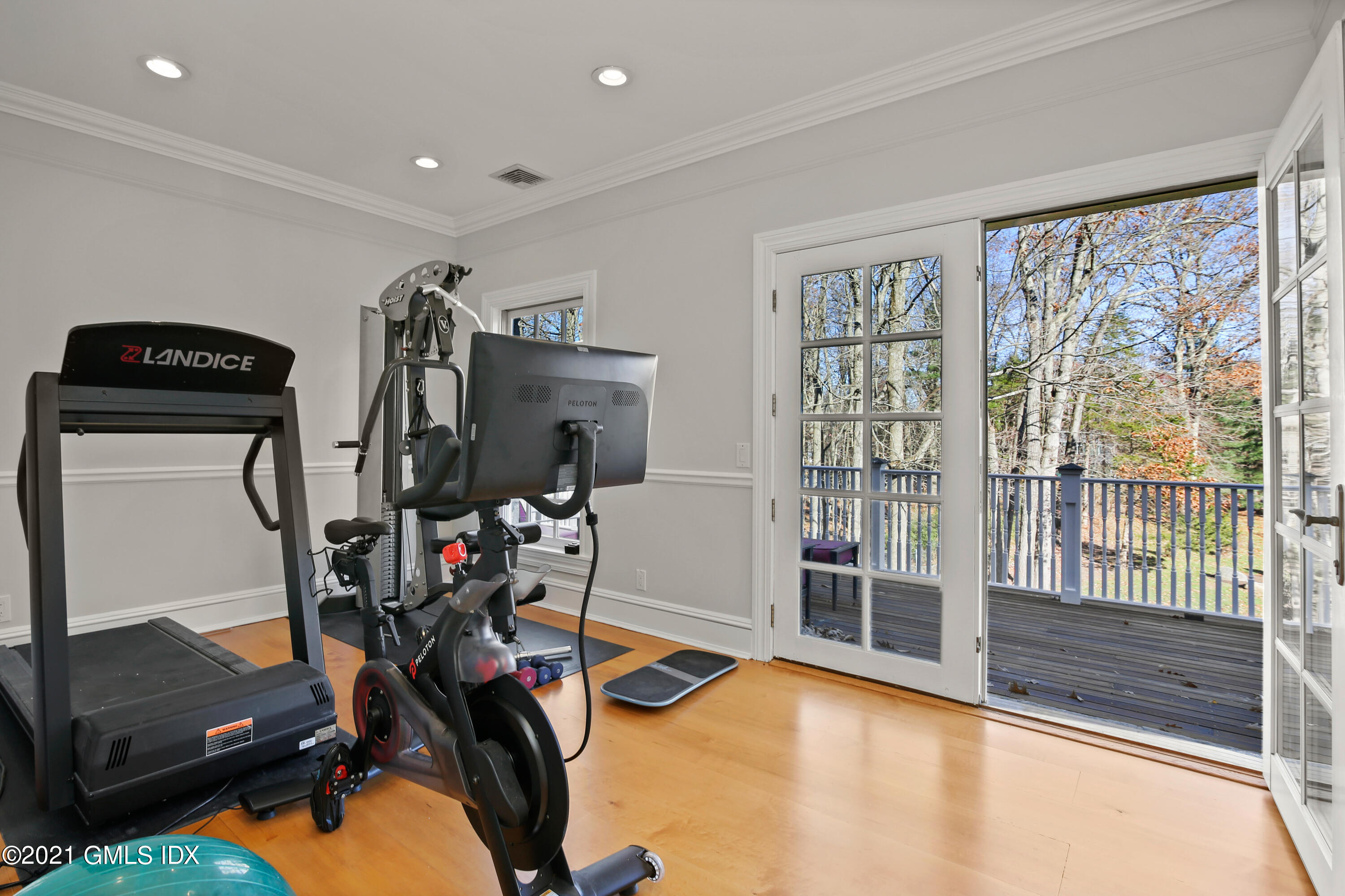 1 Juniper Hill Road Greenwich, CT 06830 - Photo 38 of 73 a view of a room with gym equipment