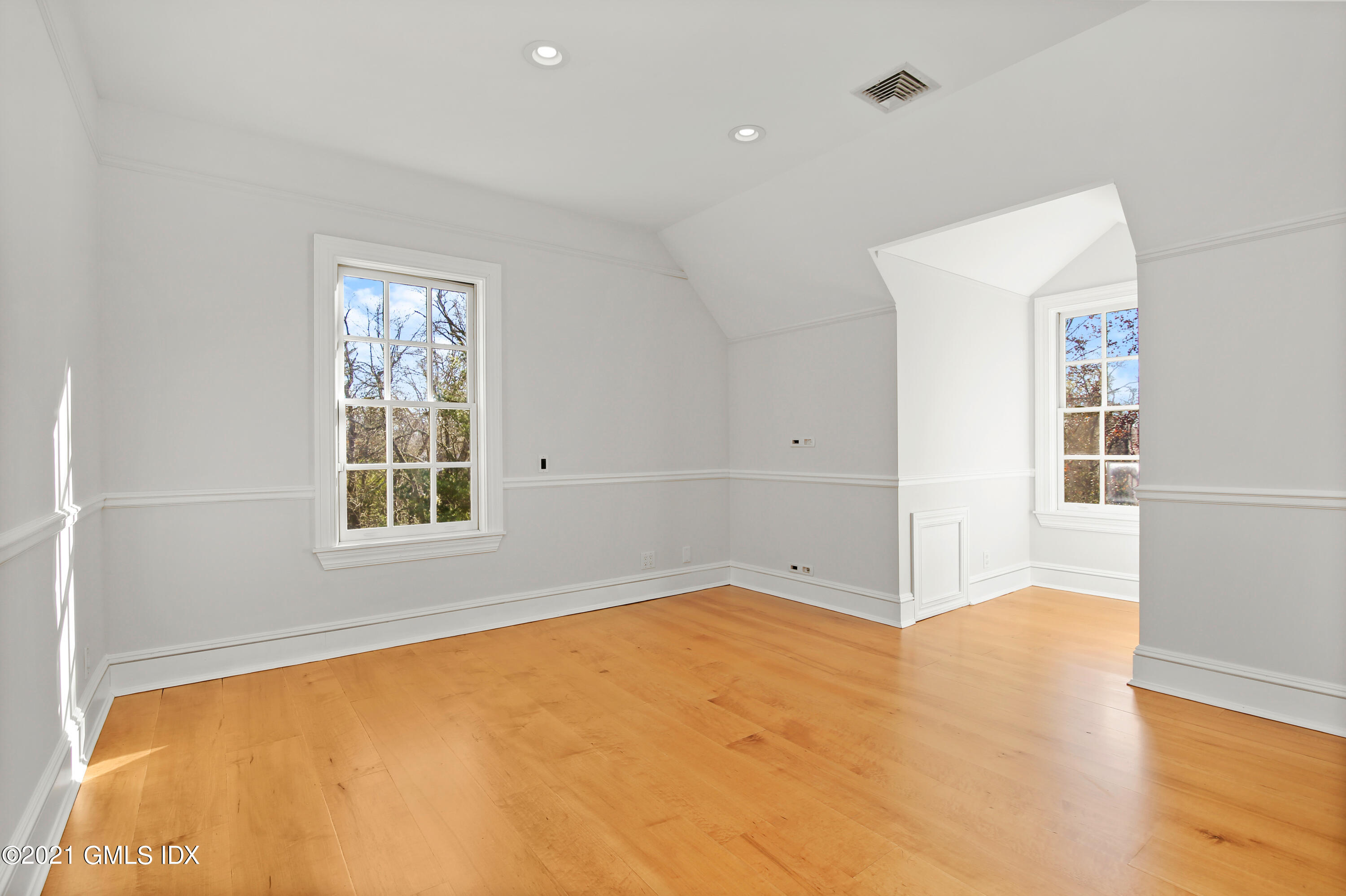 1 Juniper Hill Road Greenwich, CT 06830 - Photo 50 of 73 an empty room with windows