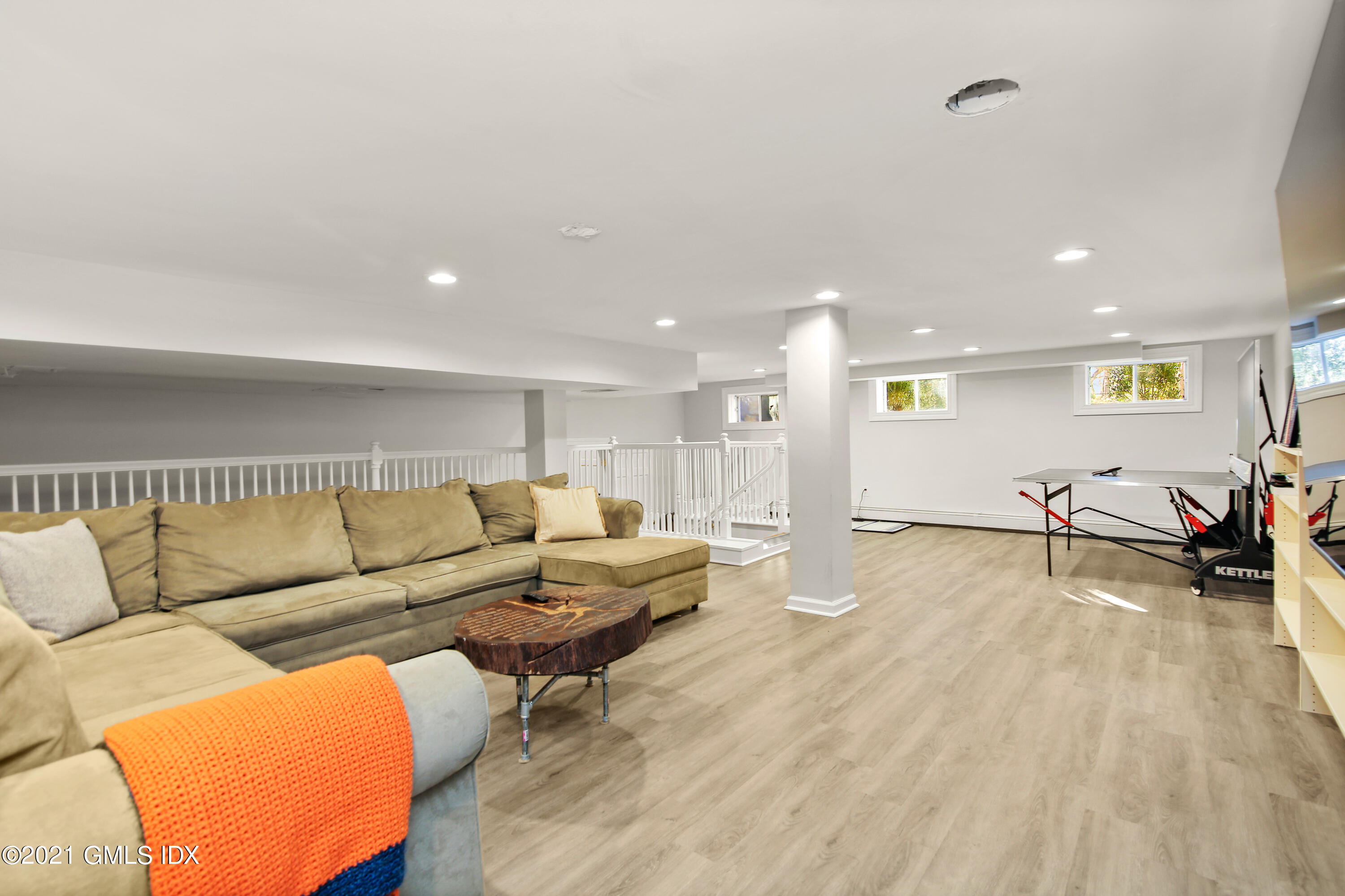 1 Juniper Hill Road Greenwich, CT 06830 - Photo 54 of 73 a living room with furniture and a wooden floor