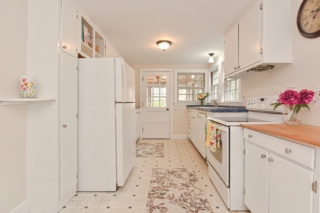 38 Red Acre Road Stow, MA 01775 - Photo 14 of 41 a kitchen with granite countertop a sink a counter top space and cabinets