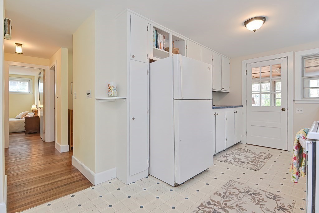 38 Red Acre Road Stow, MA 01775 - Photo 15 of 41 a view of a bedroom with wooden floor and a bathroom