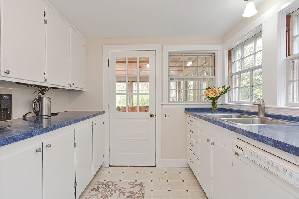 38 Red Acre Road Stow, MA 01775 - Photo 16 of 41 a kitchen with granite countertop a sink window and cabinets