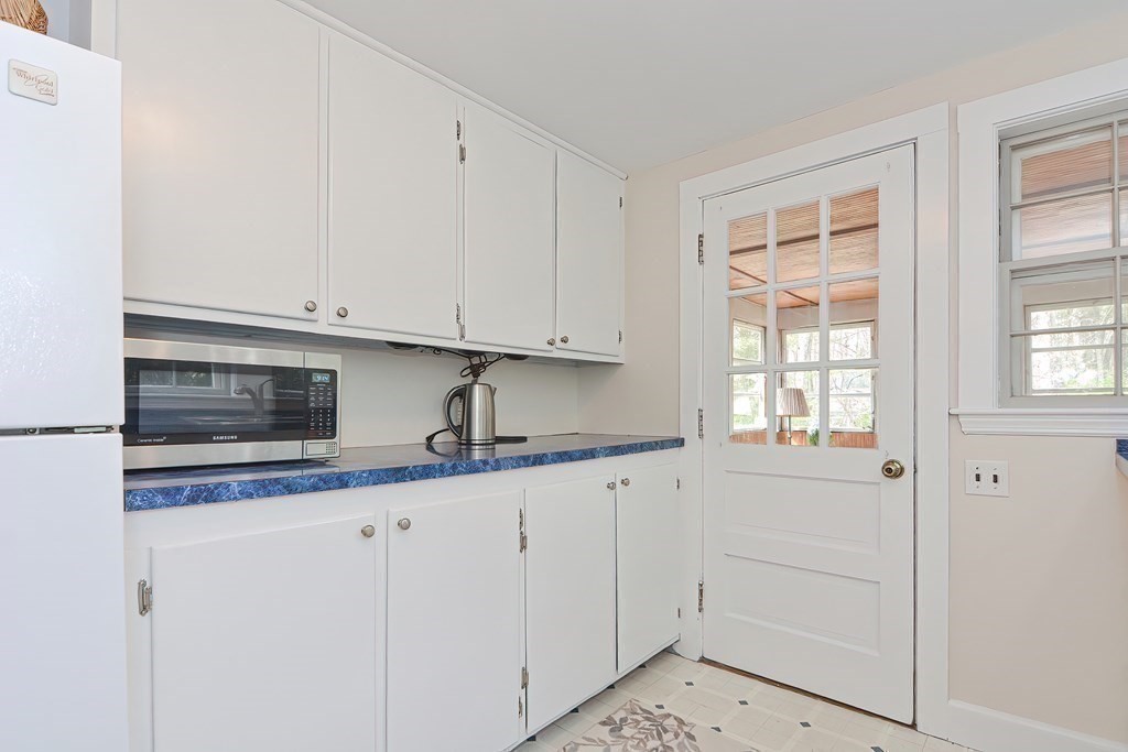38 Red Acre Road Stow, MA 01775 - Photo 17 of 41 a kitchen with granite countertop white cabinets and sink