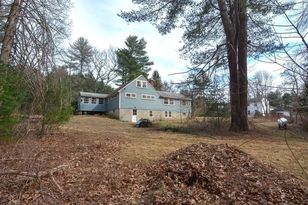 38 Red Acre Road Stow, MA 01775 - Photo 36 of 41 a view of a house with a yard
