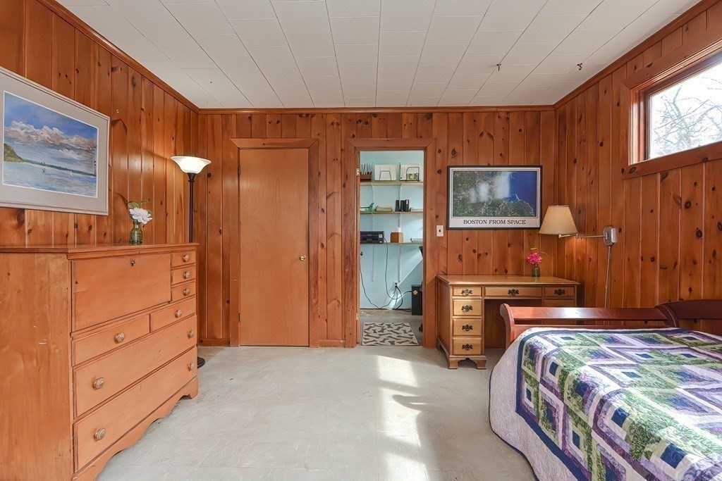 38 Red Acre Road Stow, MA 01775 - Photo 8 of 41 a bedroom with bed and flat screen tv