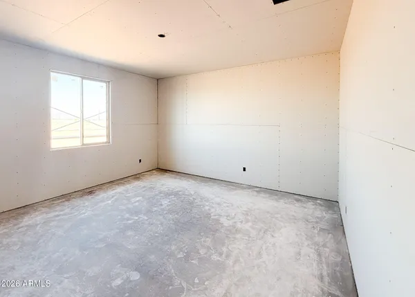 an empty room with windows