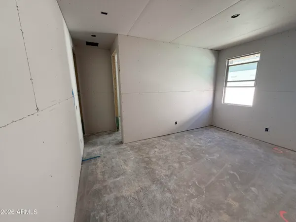 an empty room with windows