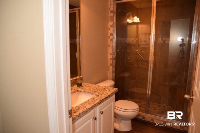 229 Spring Lake Drive Fairhope, AL 36532 - Photo 12 of 21 Guest Bath with granite and walk-in tiled shower as well.
